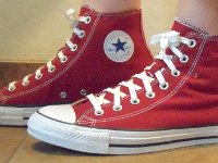 Chili Paste Red High Top Chucks  Wearing chili paste red high tops, left side view 1.